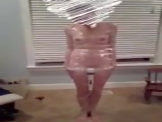 Femme wrapped en plastique bénéficie la magie baguette magique: gratuit cochon film 36