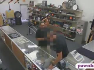 Masculine maly pounded at the pawnshop