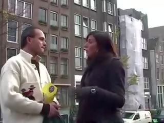 Med hans veilede vellystig turist visits en jobb kvinne i amsterdam